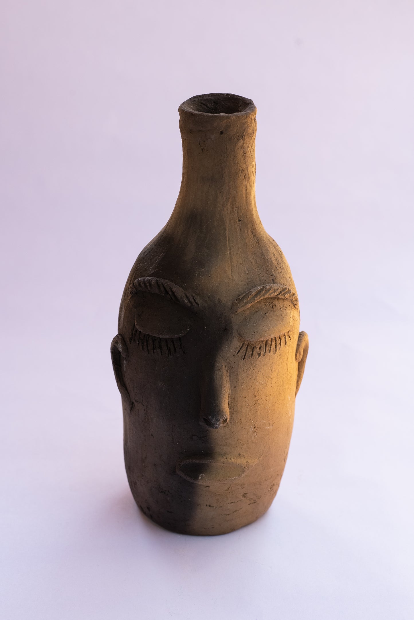 Light and Dark Clay Face Vase